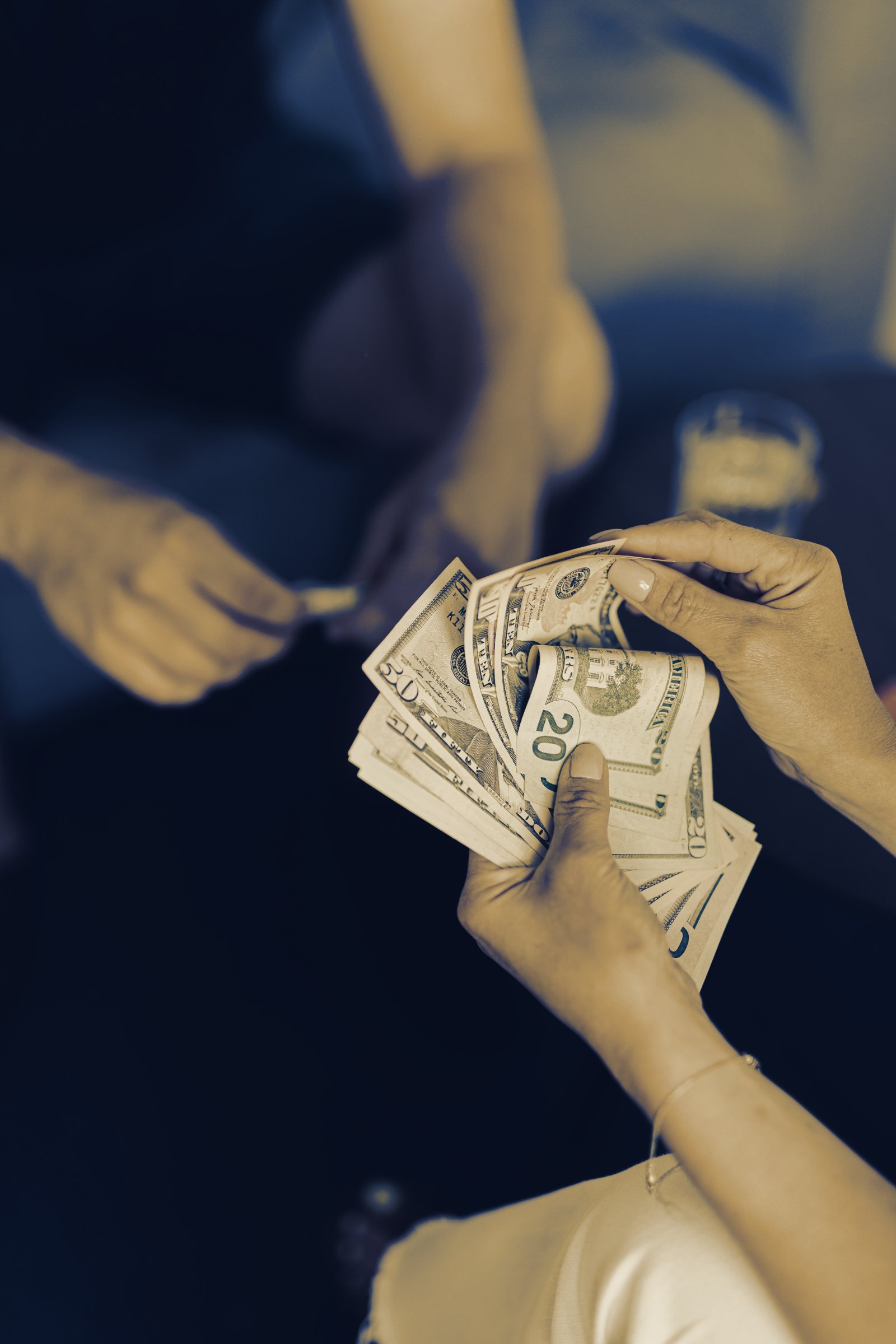 Banknotes passed from one person to another